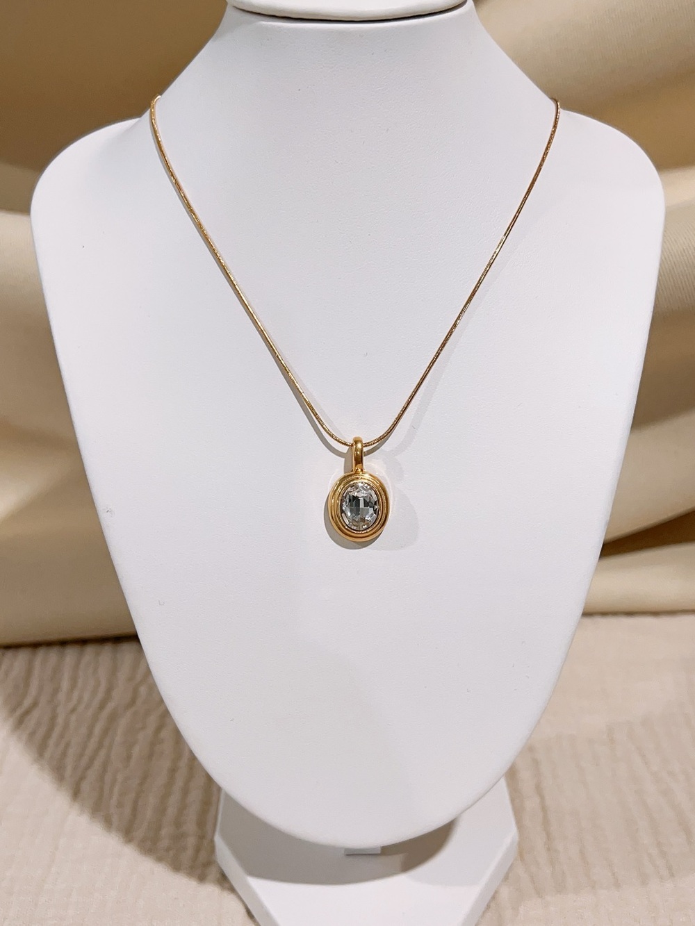 Gold Tone Pendant Necklace with Clear Stone